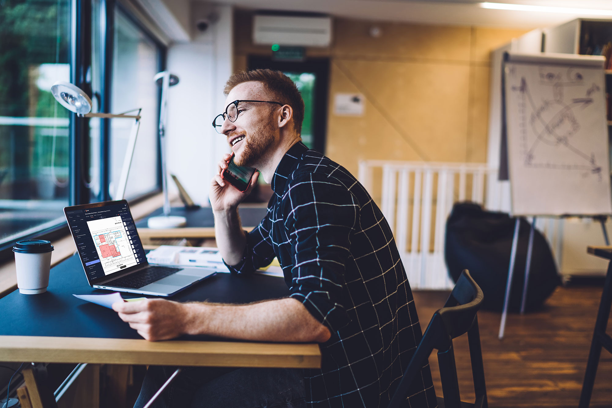 1build construction estimating software in laptop and phone