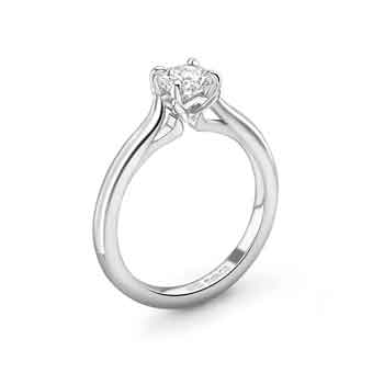 Four claw round engagement ring