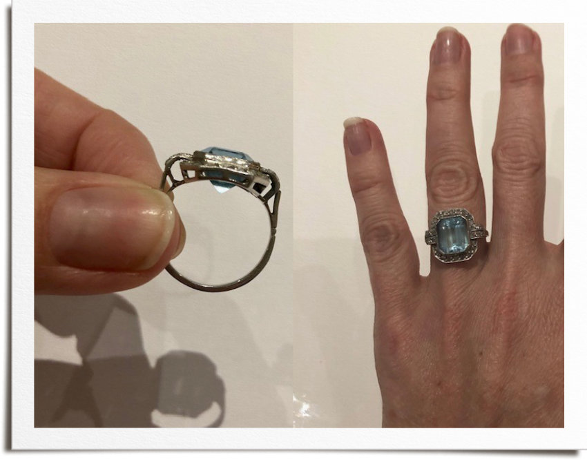 Original vintage ring with platinum and aquamarine pre remodelling. Tip of aquamarine sticking out bottom of setting.