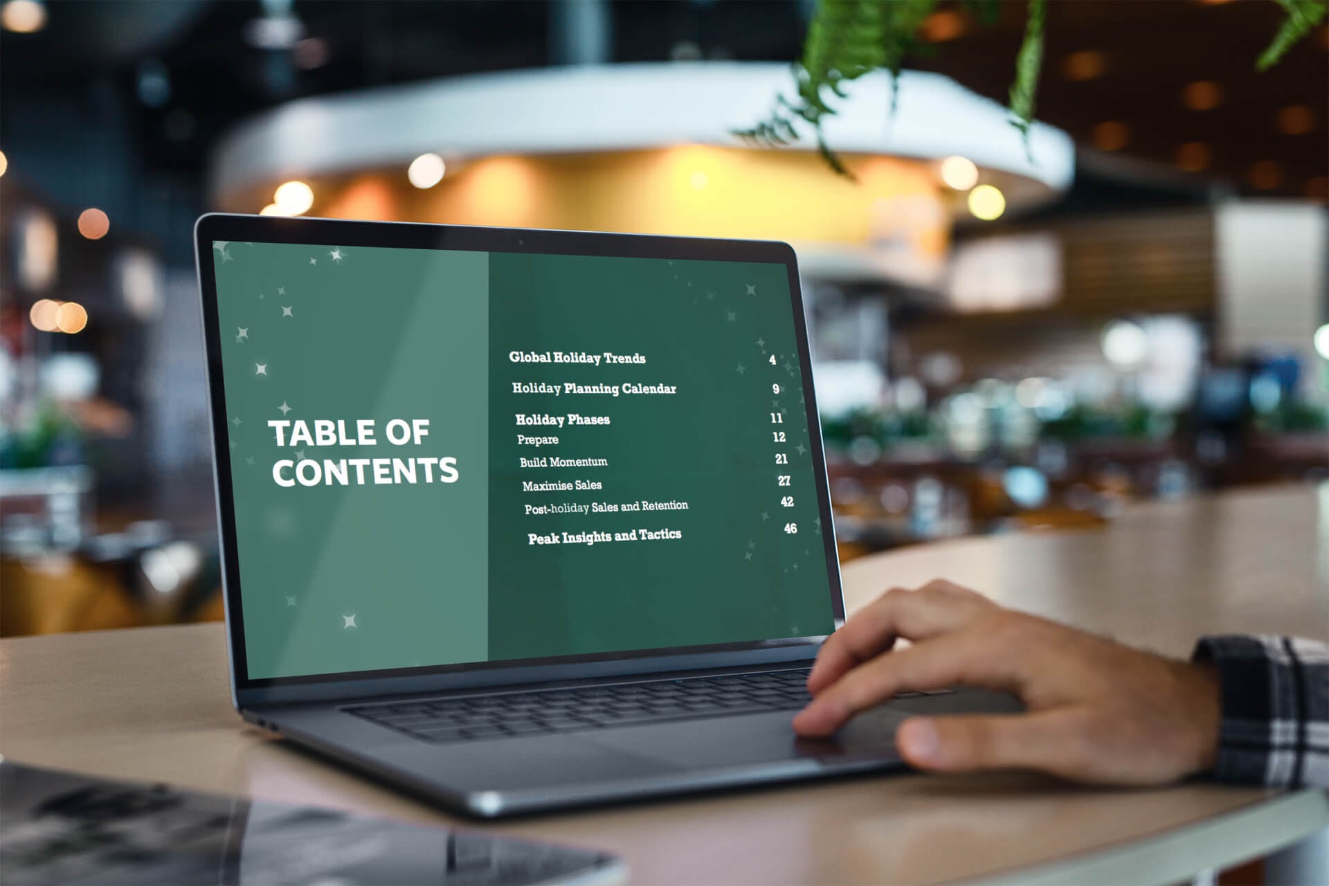 laptop showing marketing presentation holiday season green powerpoint