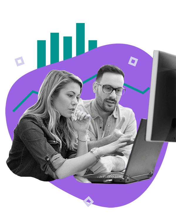 man and woman pointing at computer with graph elements