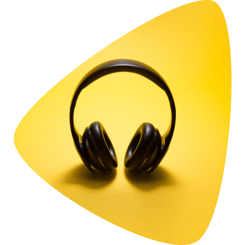 Over the ear headphones on a yellow background.