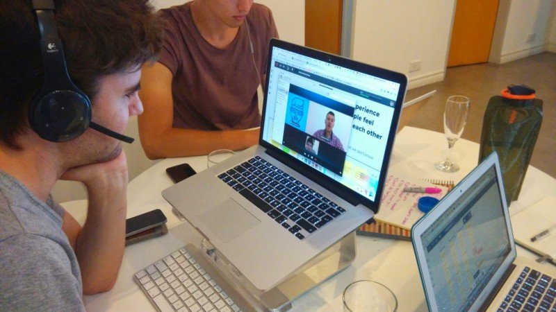 Marcel conducts a Skype video call on his laptop