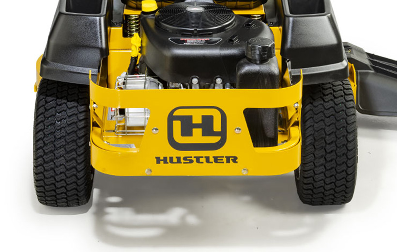 Image of the rear metal guard around the engine of a yellow mower