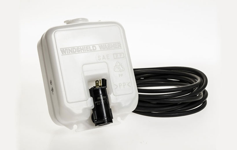 Image of a washer fluid tank and hose on a white background.