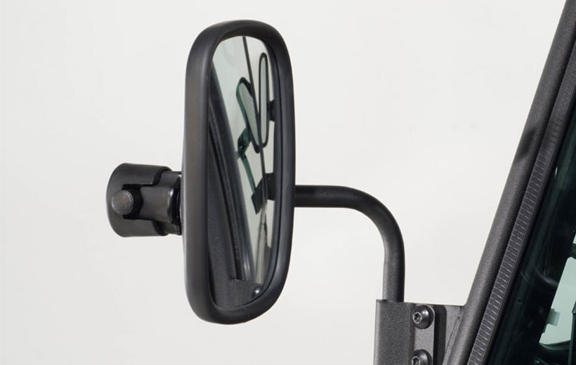 Image of a side mirror on a utility vehicle with a white background