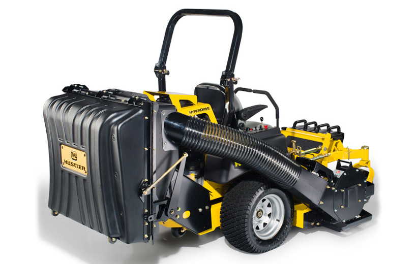 Image of the back of a mower with a black rectangular grass catcher mounted to the mower