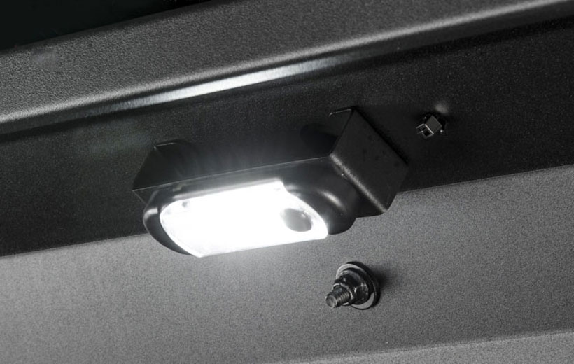 Image of a dome light mounted on a metal bar.