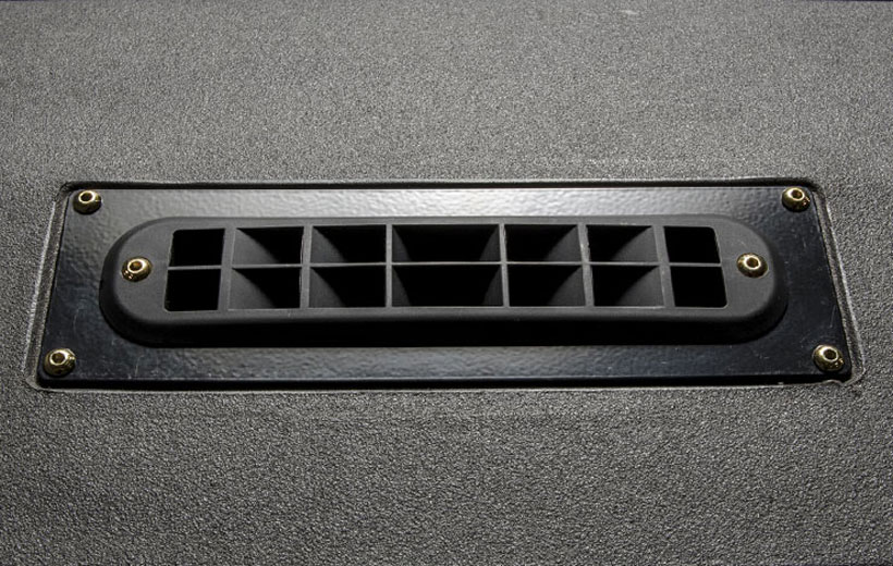 Image of a black vent on a dash of a utility vehicle.