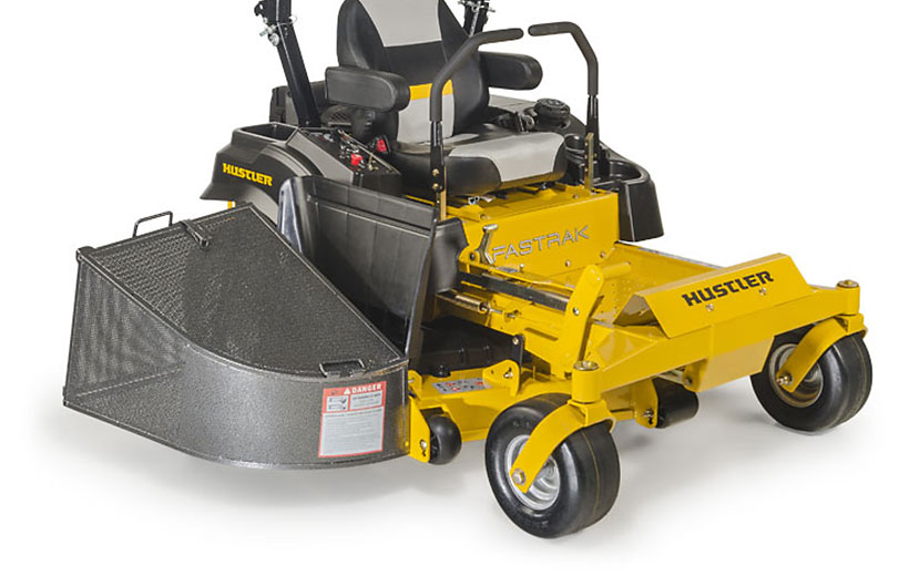 Image of front of a yellow mower with a black metal grass bagger mounted on the side