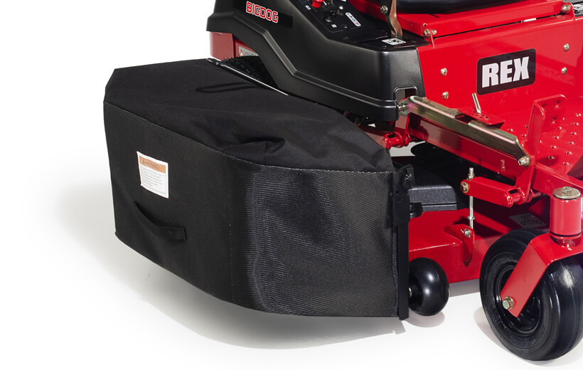 Image of red mower with grass bagger mounted to the side of the deck.