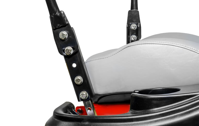 Image of black metal extension added on steering bar of mower