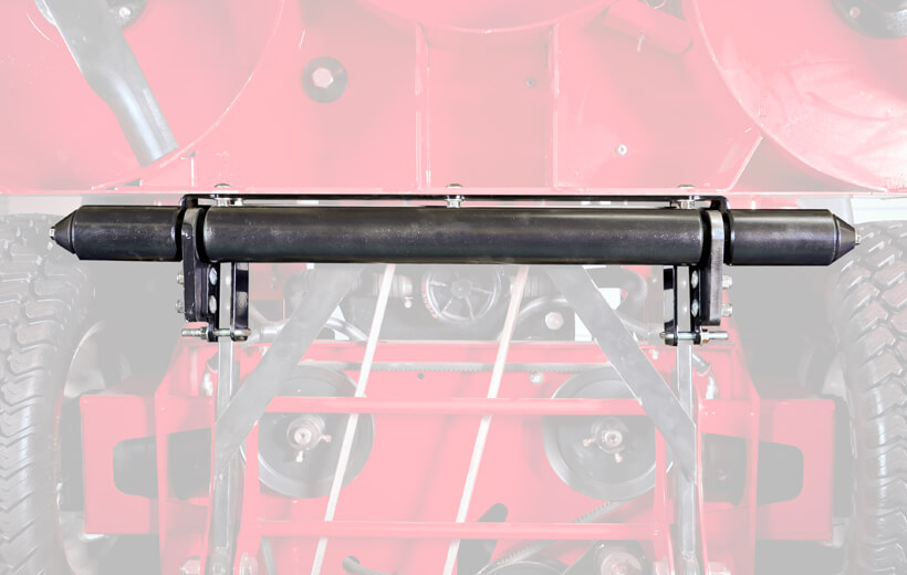 Image of a roller mounted under a mower behind the deck
