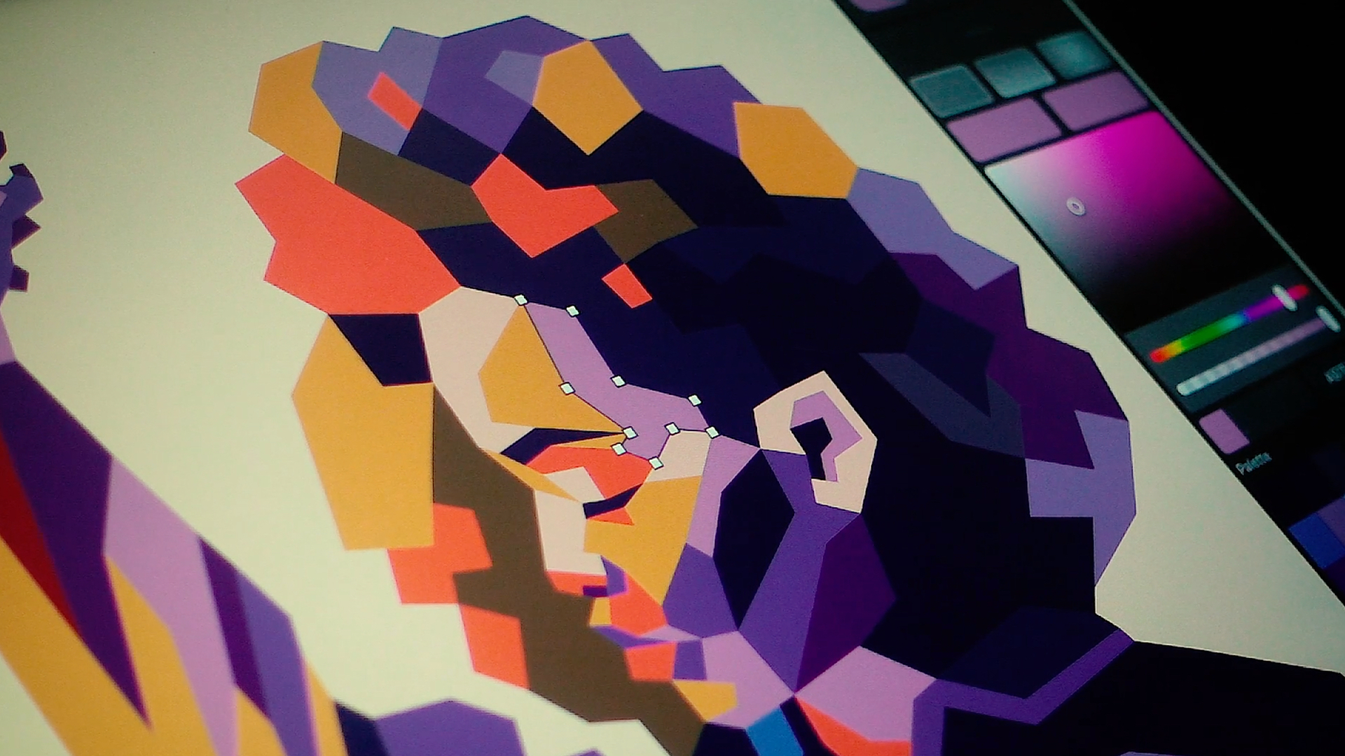 Close-up of a geometric digital portrait on a screen