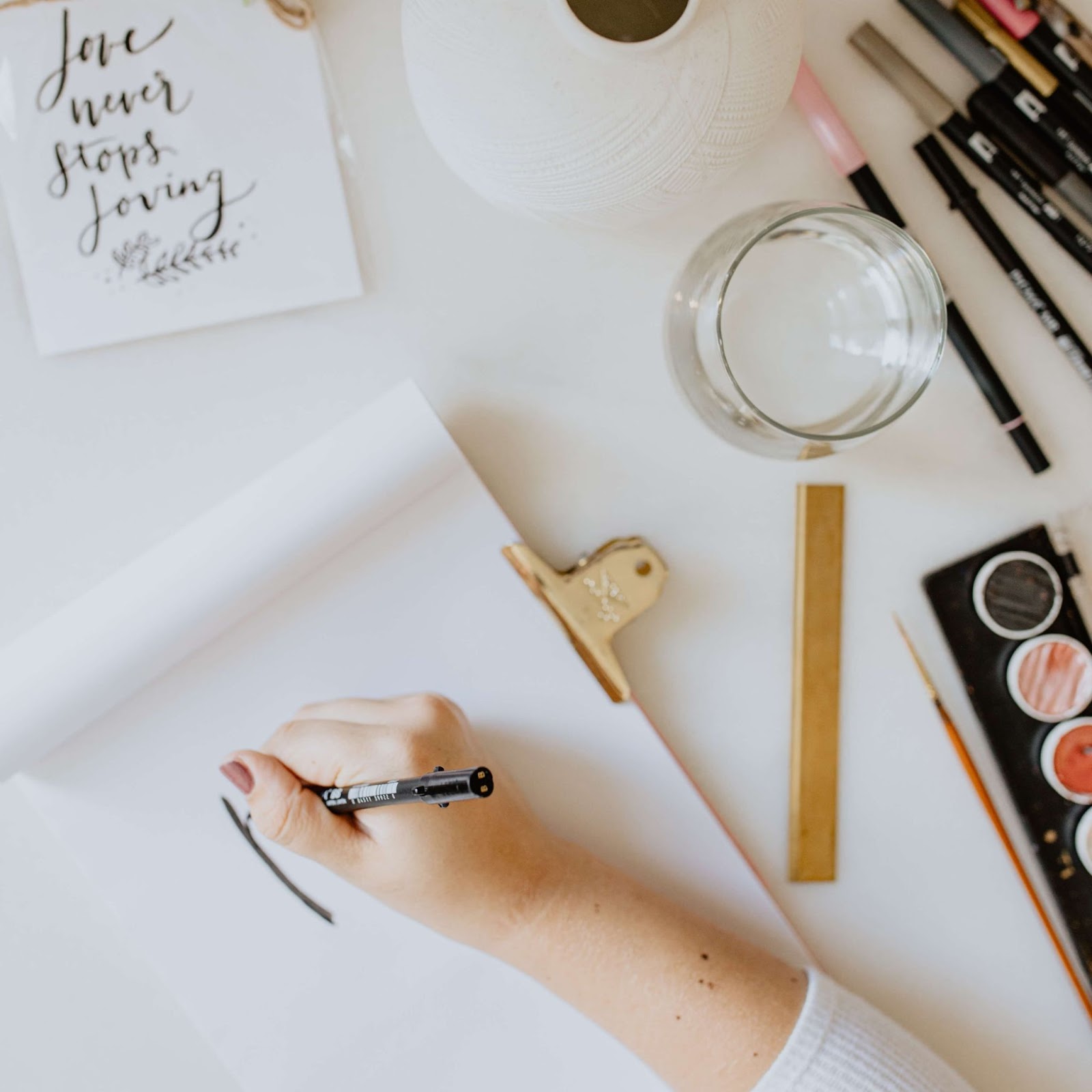 artist workspace doing hand lettering