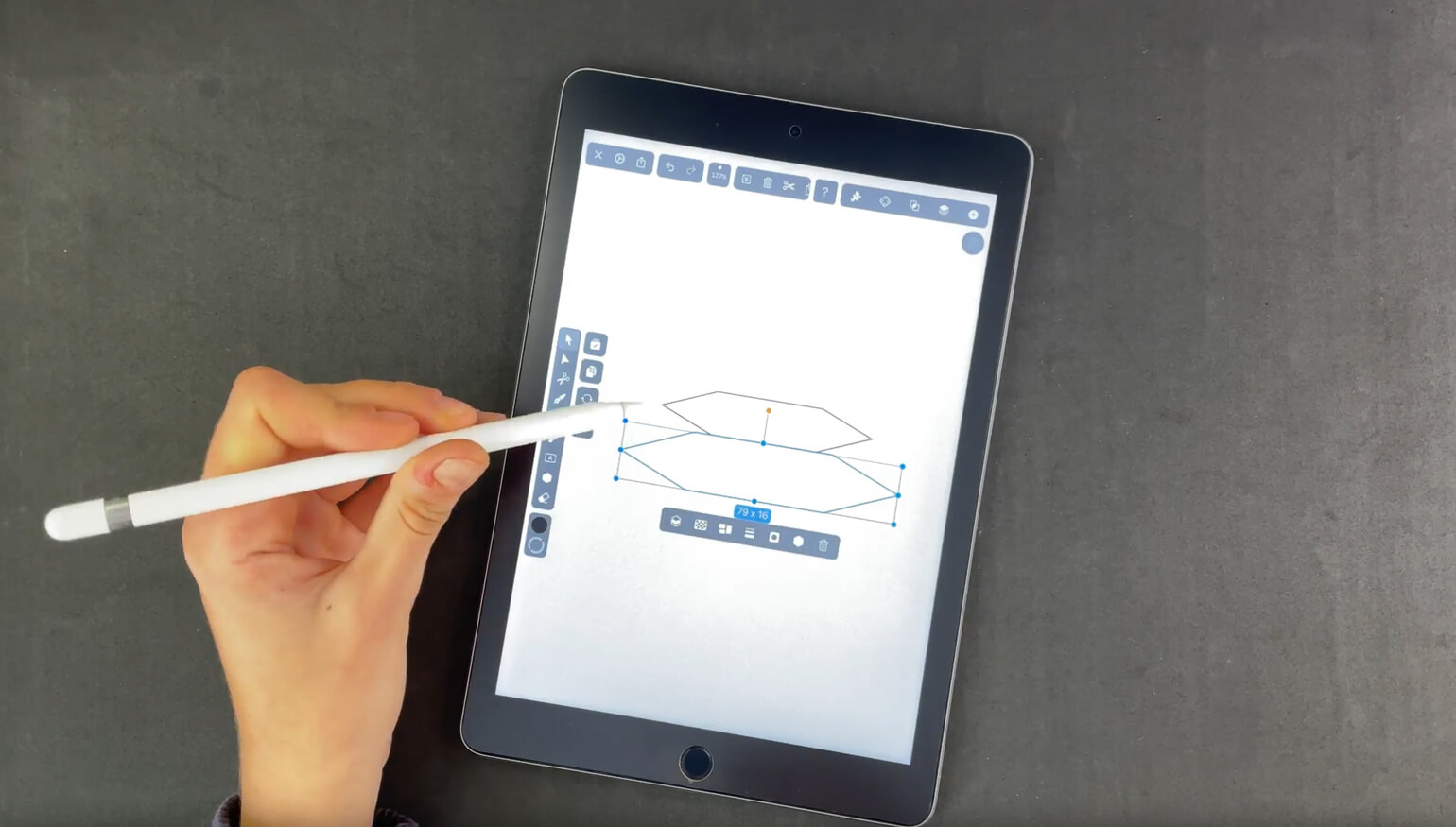  Stylus adjusting a geometric drawing on a digital tablet