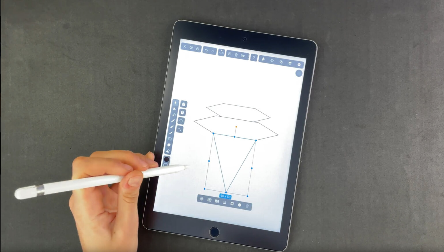 Stylus editing a diamond shape on a digital tablet screen