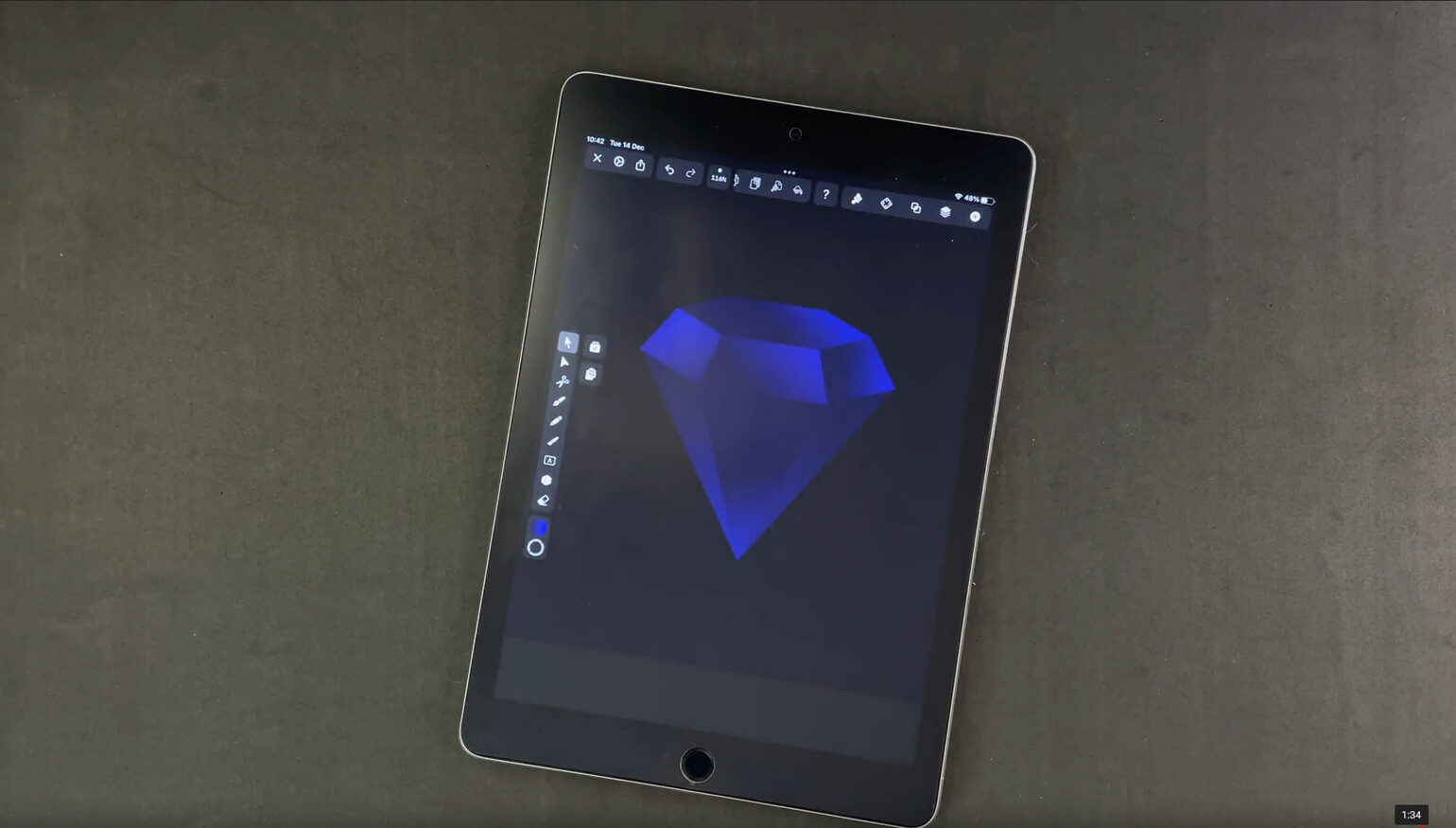 Digital tablet displaying a finished gradient-filled diamond illustration