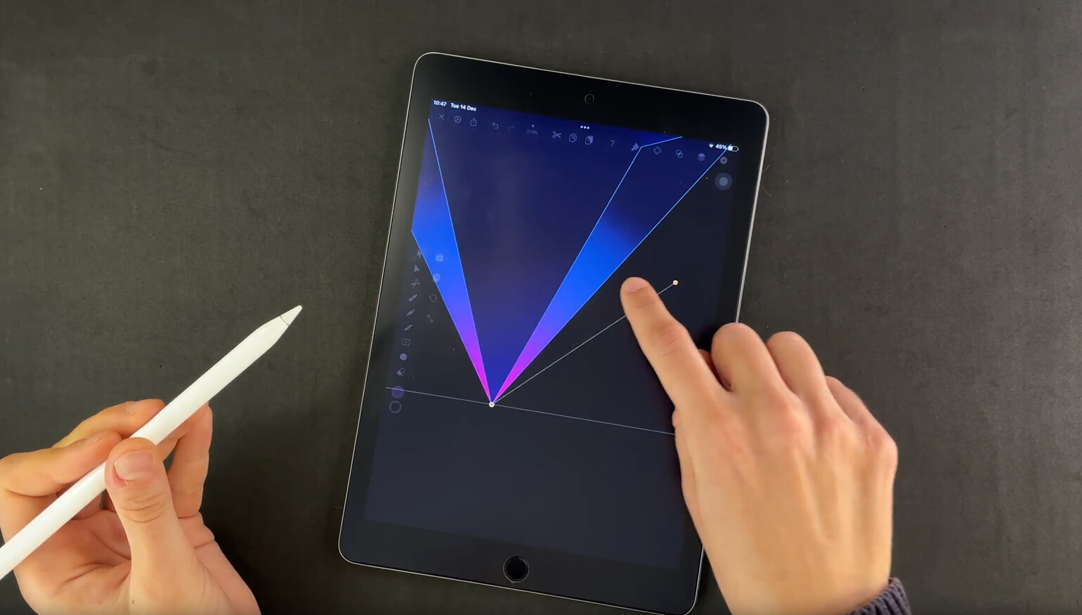 Hand holding a stylus and another hand touching a diamond graphic on a tablet screen