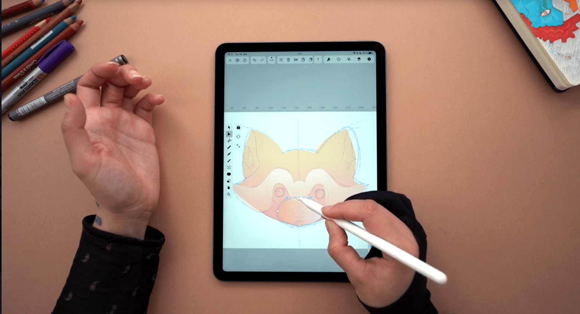 Drawing a red panda snout on iPad using Vectornator