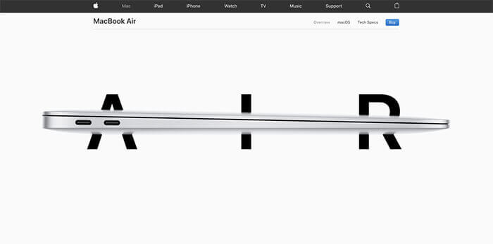 Side view of a Mac Book Air Laptop over letters on a white background.
