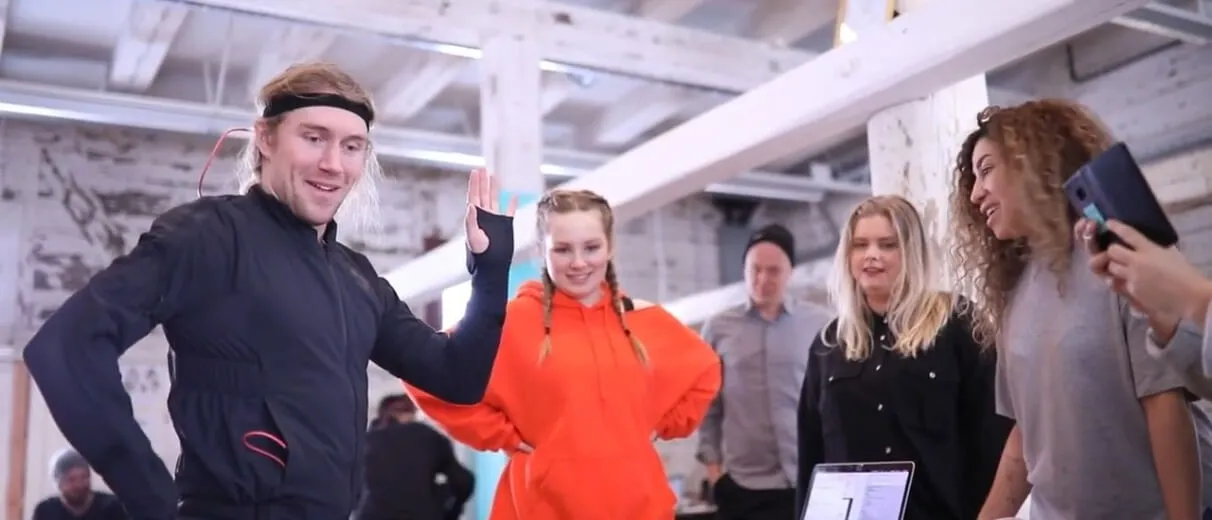 A group of students trying a mocap suit
