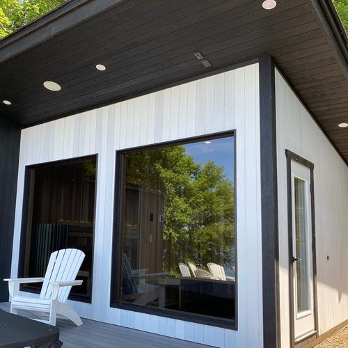 Four people inside a sauna