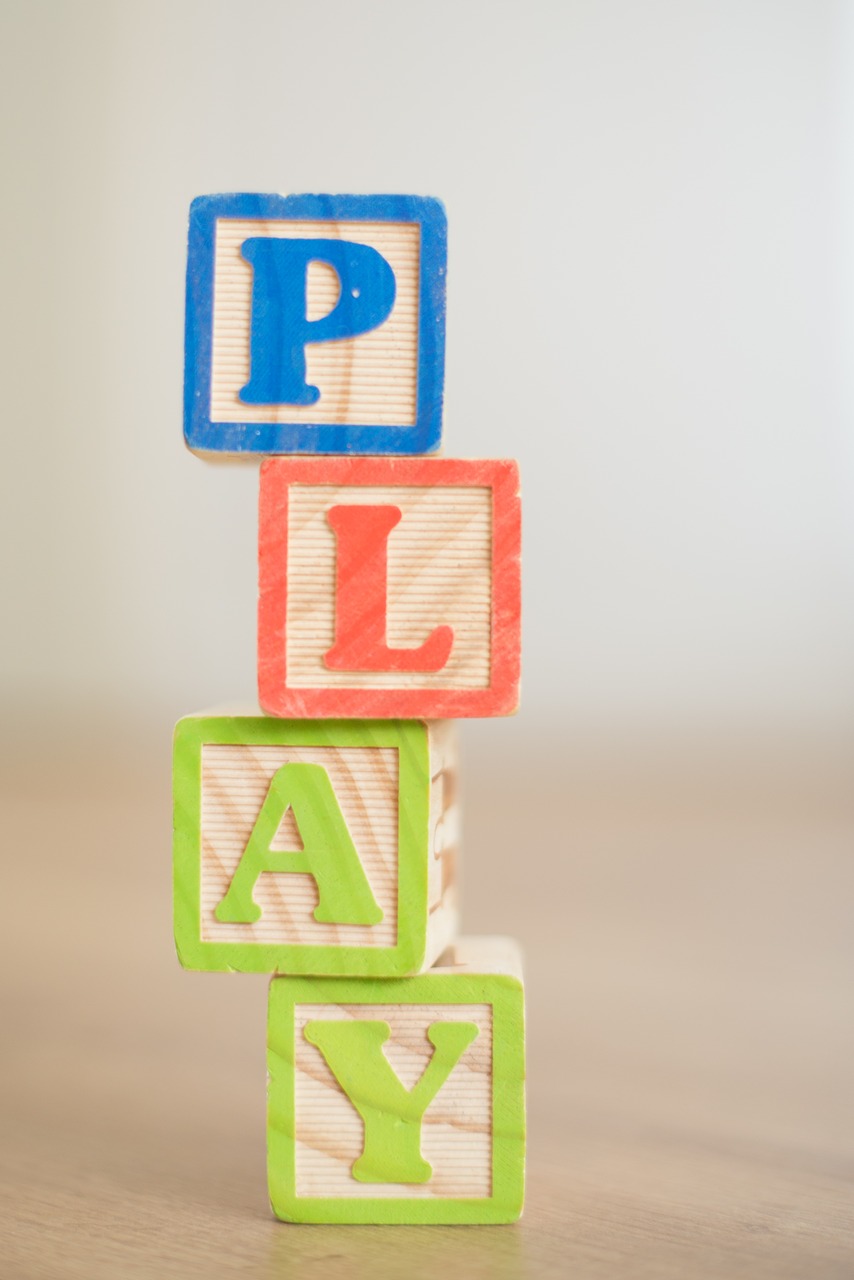 Wooden building blocks spelling play