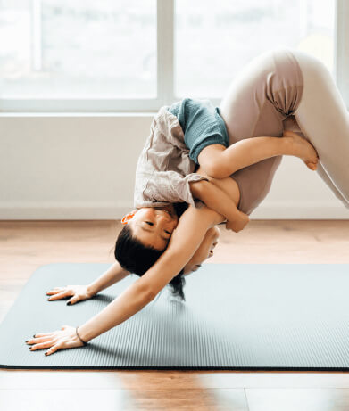 Mother And Son Doing Yoga