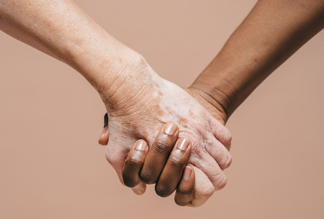 Two Women Holding Hands
