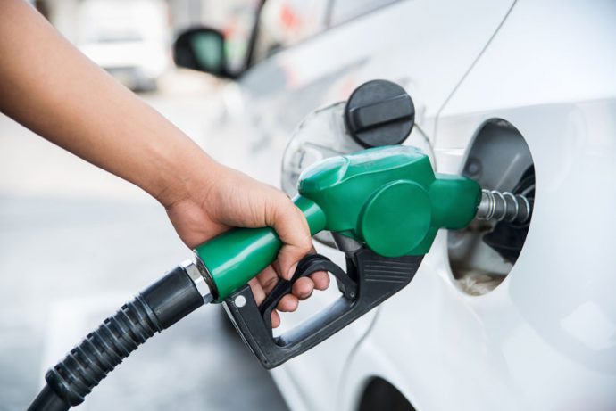 putting petrol in a car