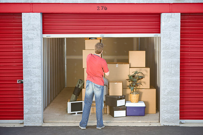 man finished putting stuff in storage