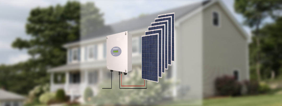 Ein Wechselrichter mit Solarpanels vor einem weißen Haus