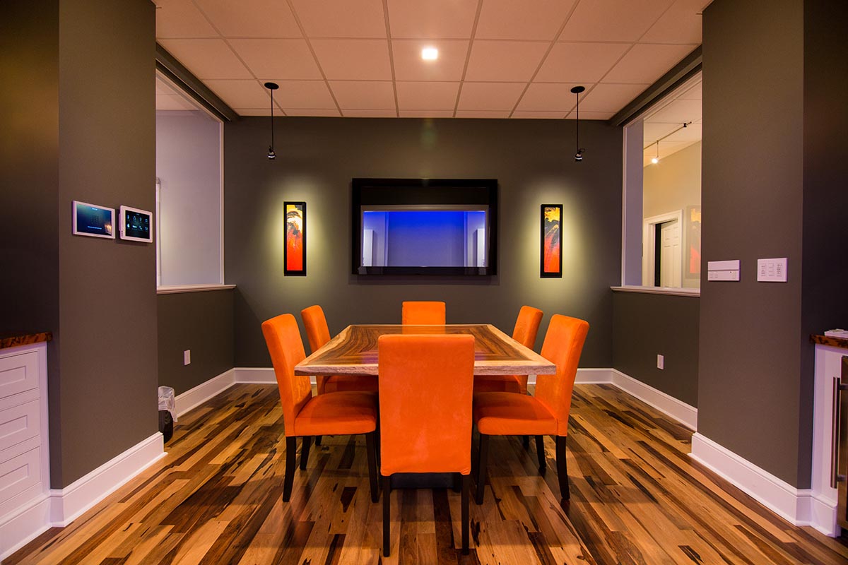 RMS conference room with integrated TV and art speakers