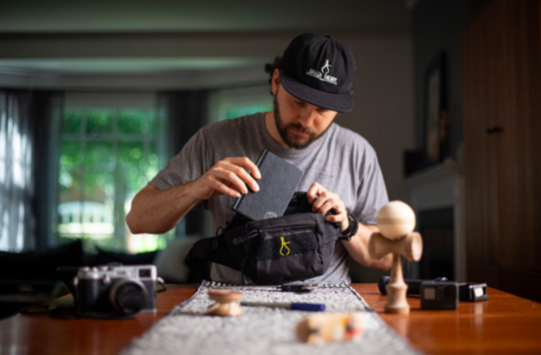 man filling newly designed bag
