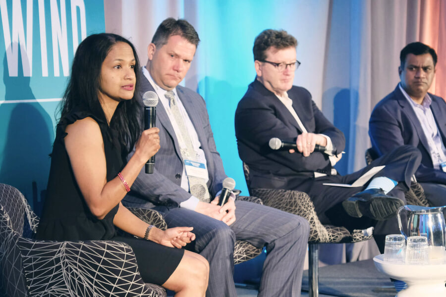 Speakers at a Financing Wind event.