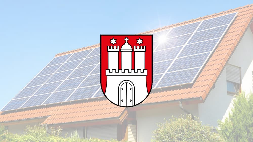 Hamburger Stadtwappen mit Solarhaus im Hintergrund