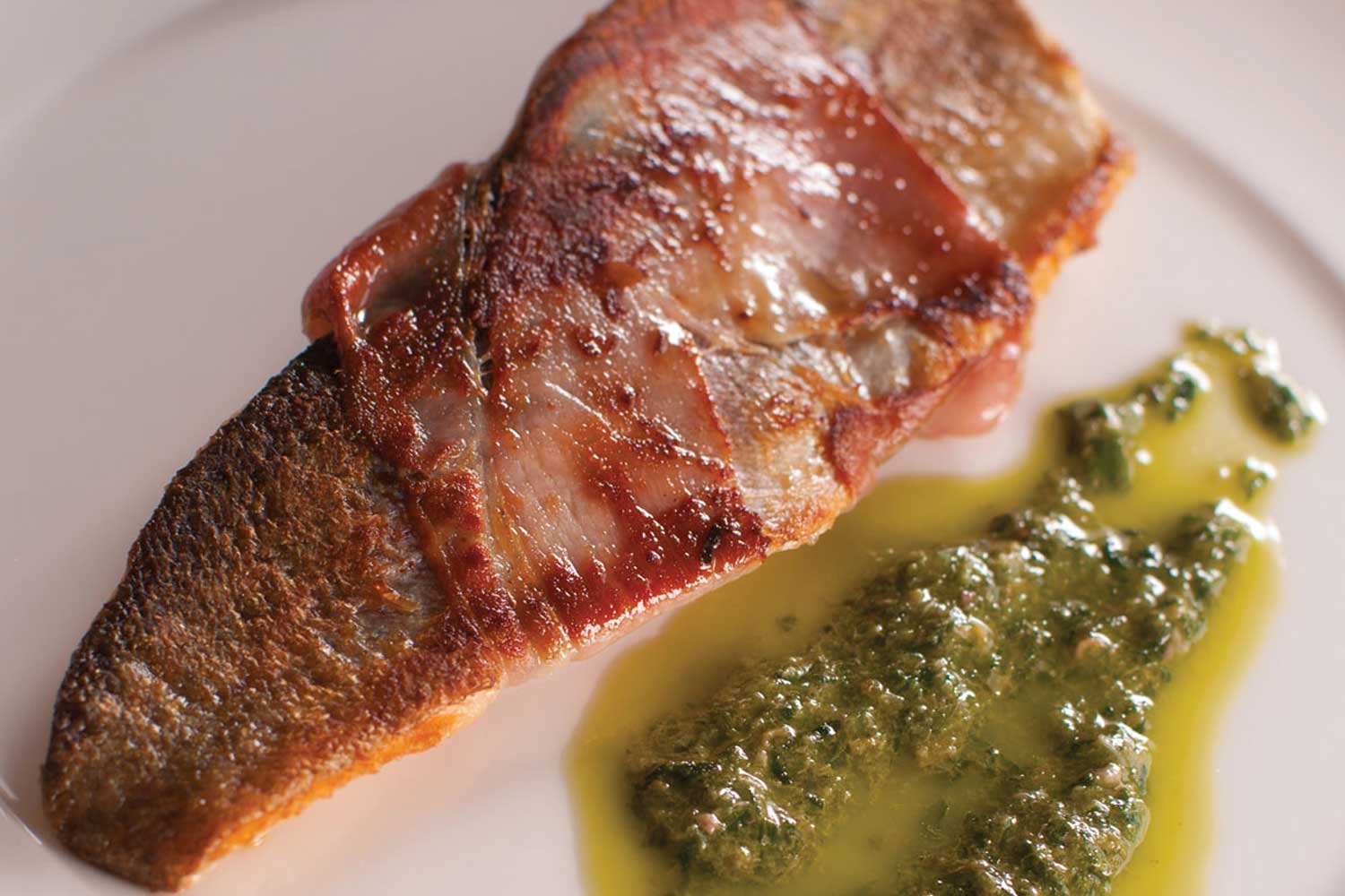 Devon Trout wrapped in Parma Ham served with Wild Garlic Salsa Verde