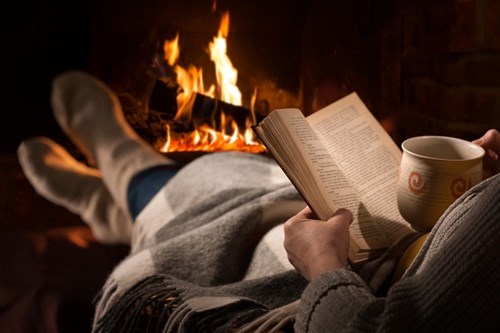 Reading in front of the fire