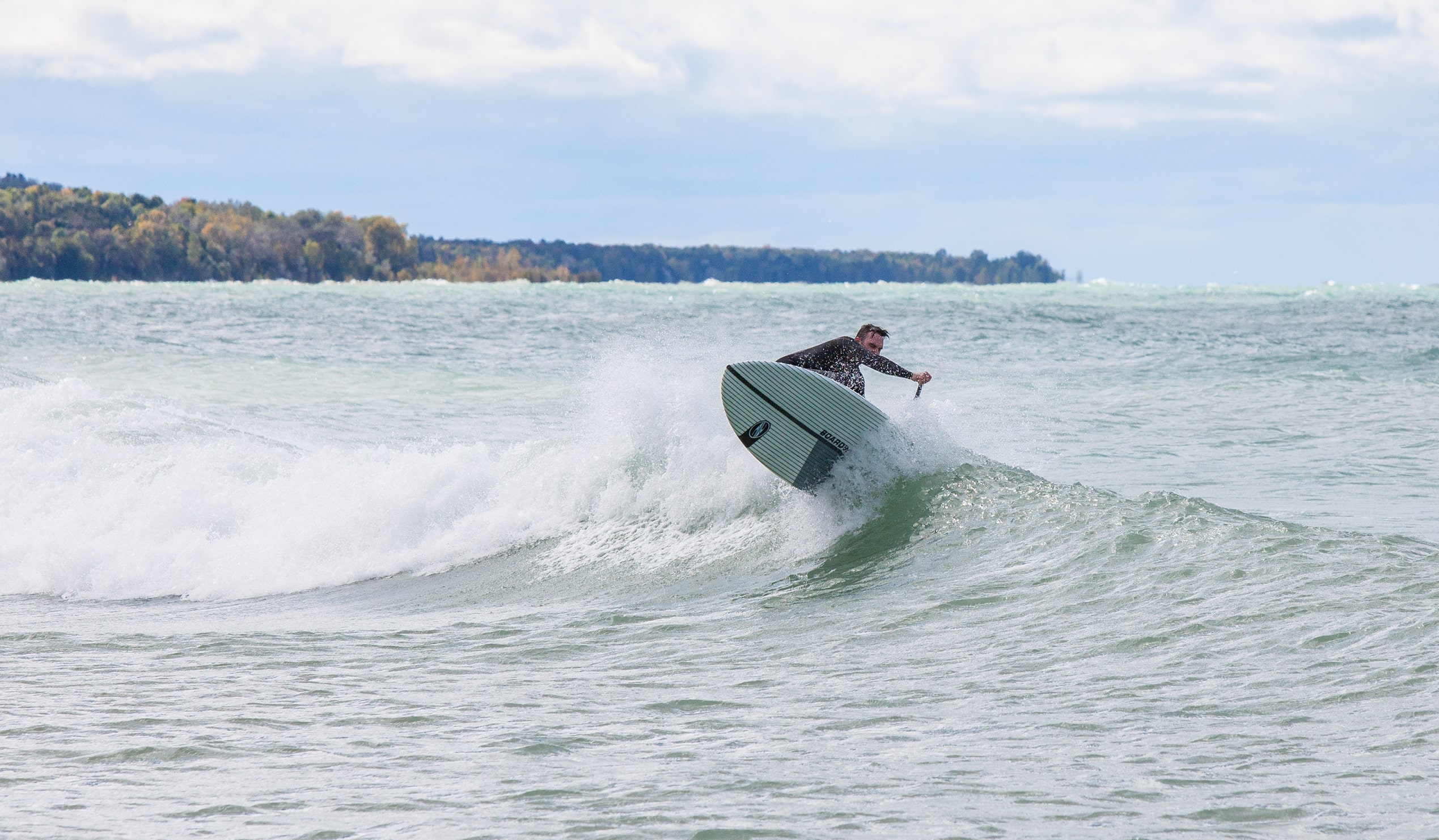 Man surfing on a lake