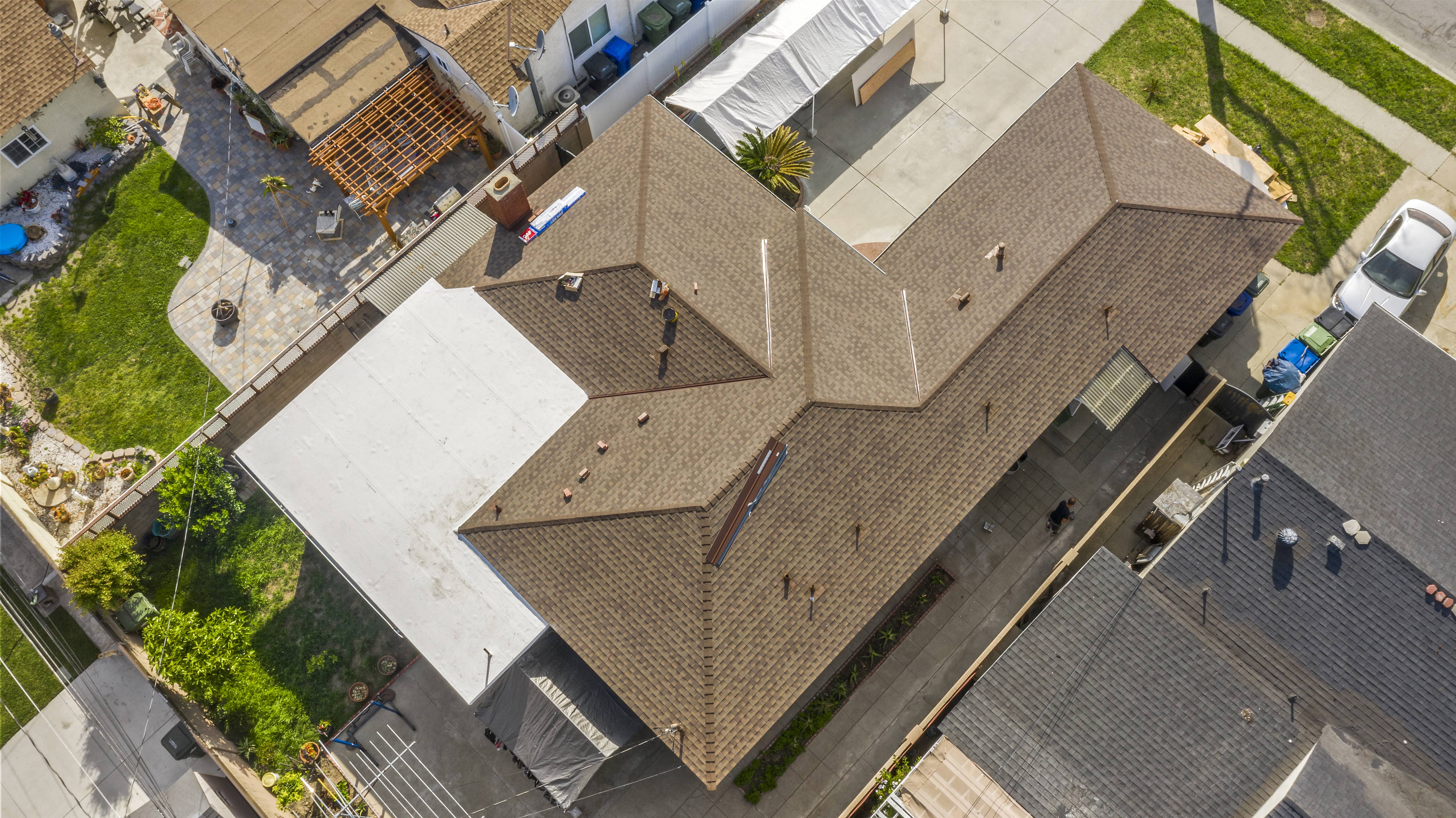 The Dark Side of Asphalt Roofing Environmental Impact and Recycling