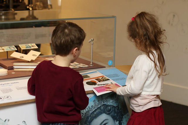two children in the bank of england museum