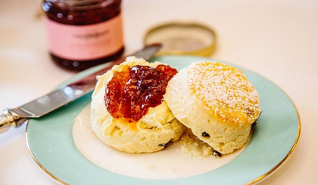 open scone with jam