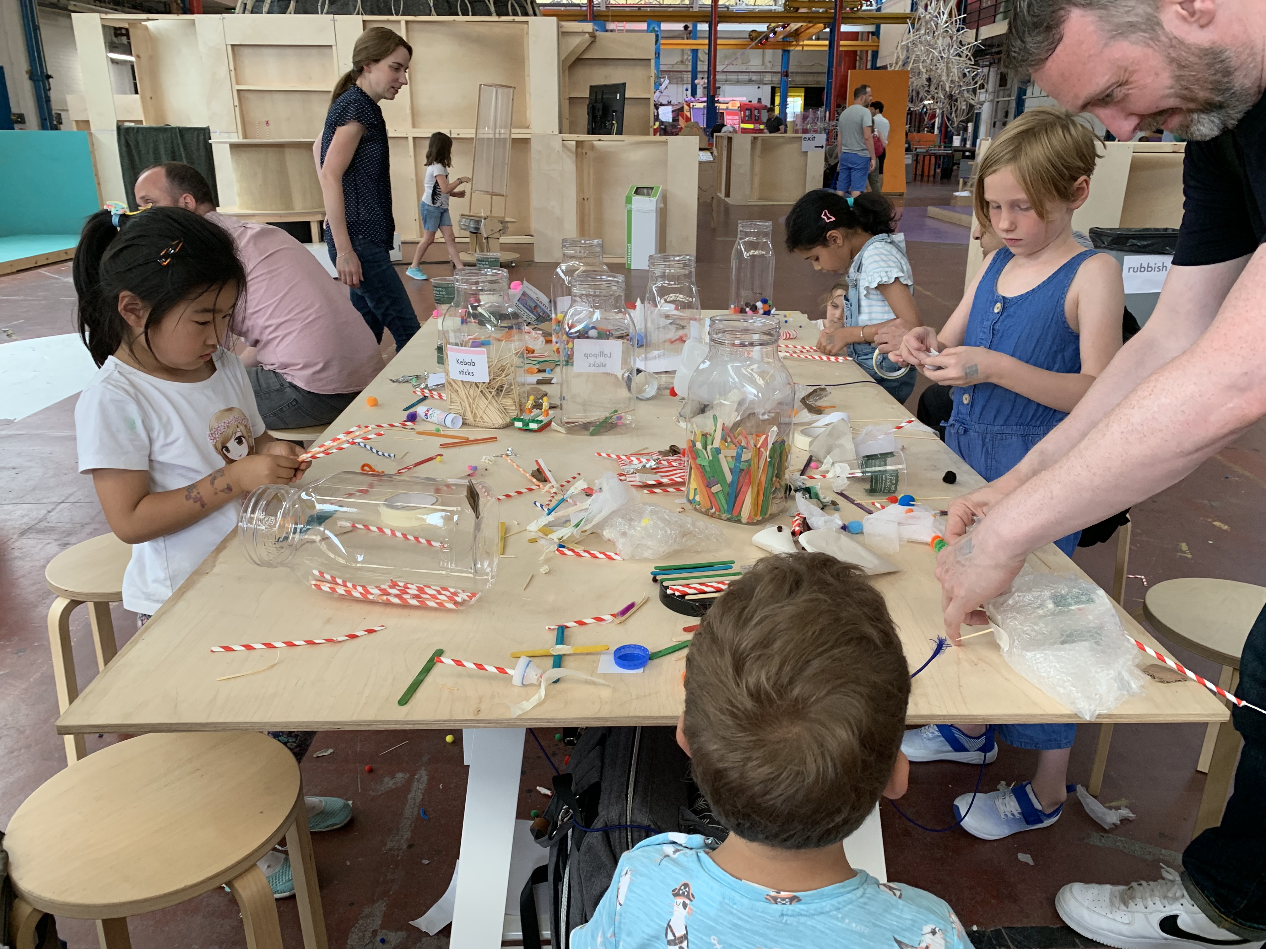 group of kids doing arts and crafts