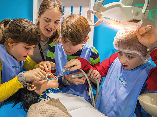 kids playing dentists at the british dental association museum