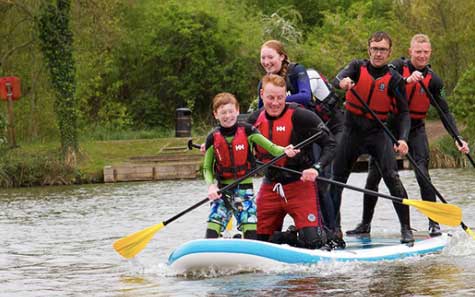 family doing water sports