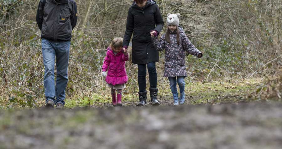 family walking in the park