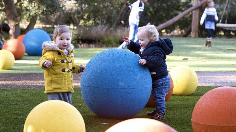 toddlers playing at new children's garden at kew gardens