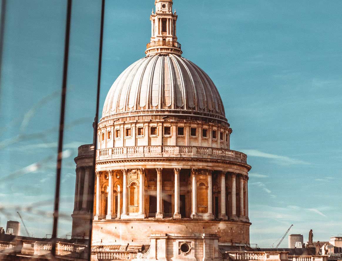 St Paul's Cathedral with blue sky behind.