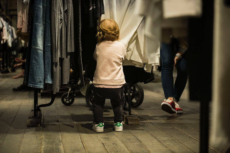 Child helping with post-lockdown shopping
